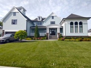 Modern house with green lawn