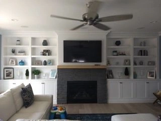 Elegant living space with built-in bookshelves