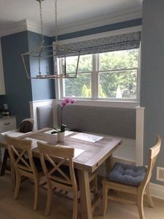 Dining area with wooden table and chairs