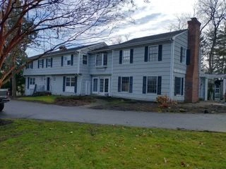 Two-story house with brick chimney