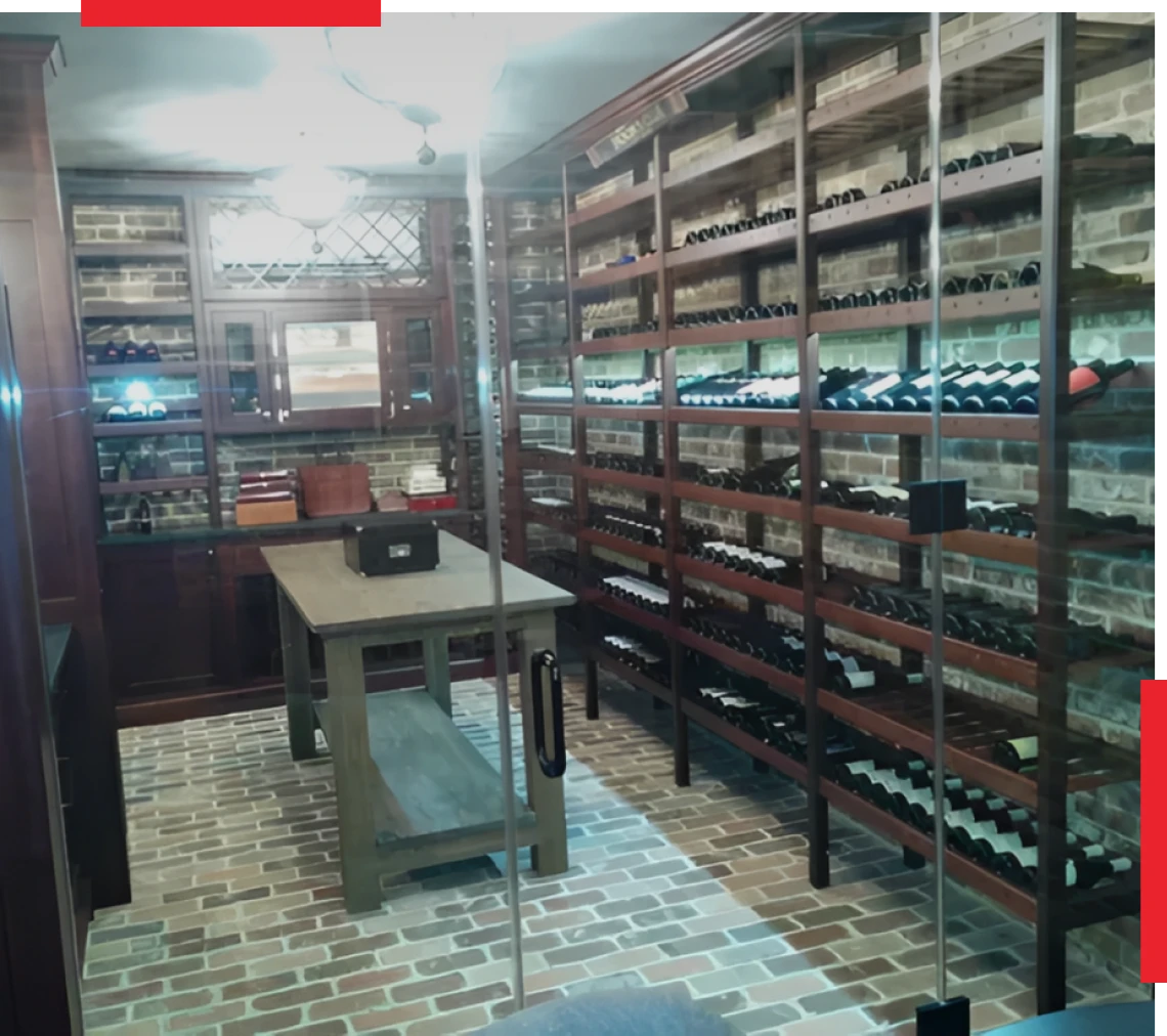 Glass door wine cellar with organized racks.